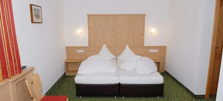 Doppelbett in der Ferienwohnung Anton im Hotel Bacherhof